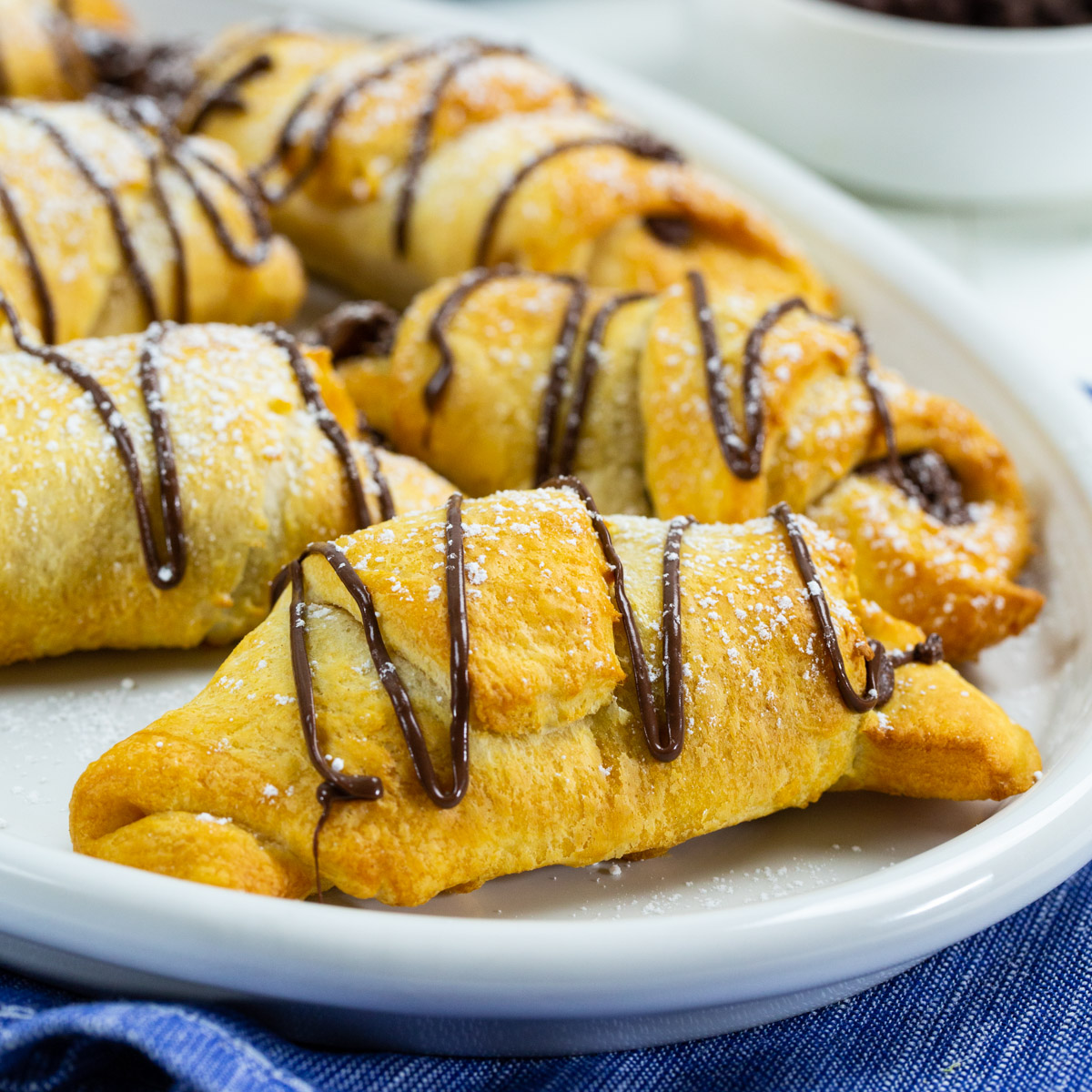 Air fryer Nutella Crescents on serving plate.