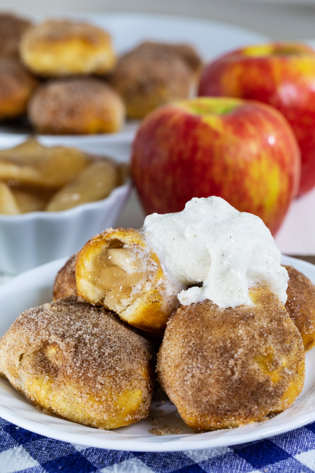 Air Fryer Apple Pie Bites topped with ice cream.