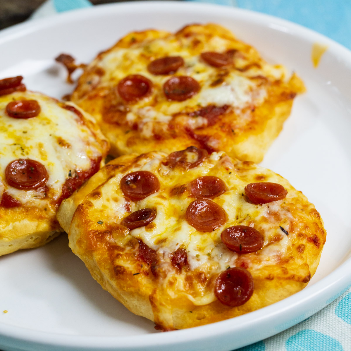 Biscuit Pizzas on a plate.