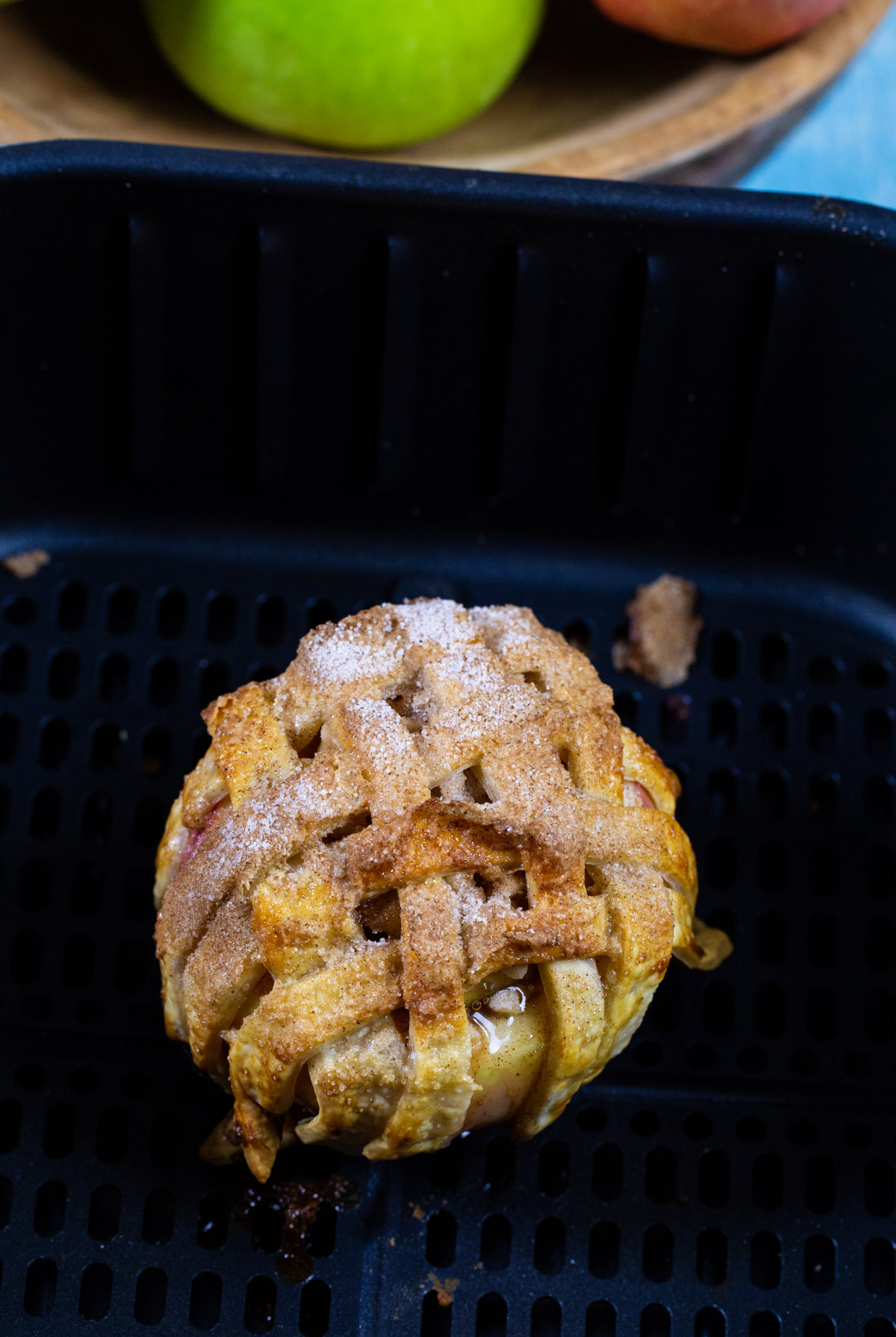 Apple Pie Baked Apple in air fryer basket.