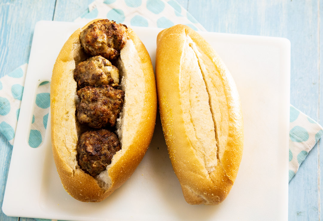 Meatballs stuffed into sub.