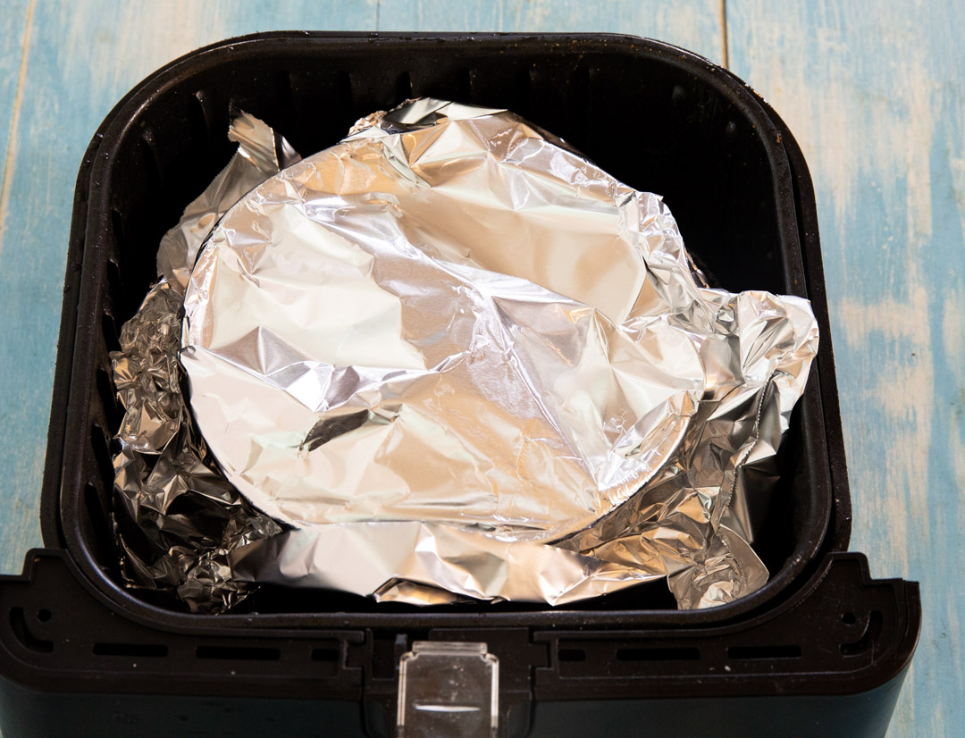 Cover cake with foil.