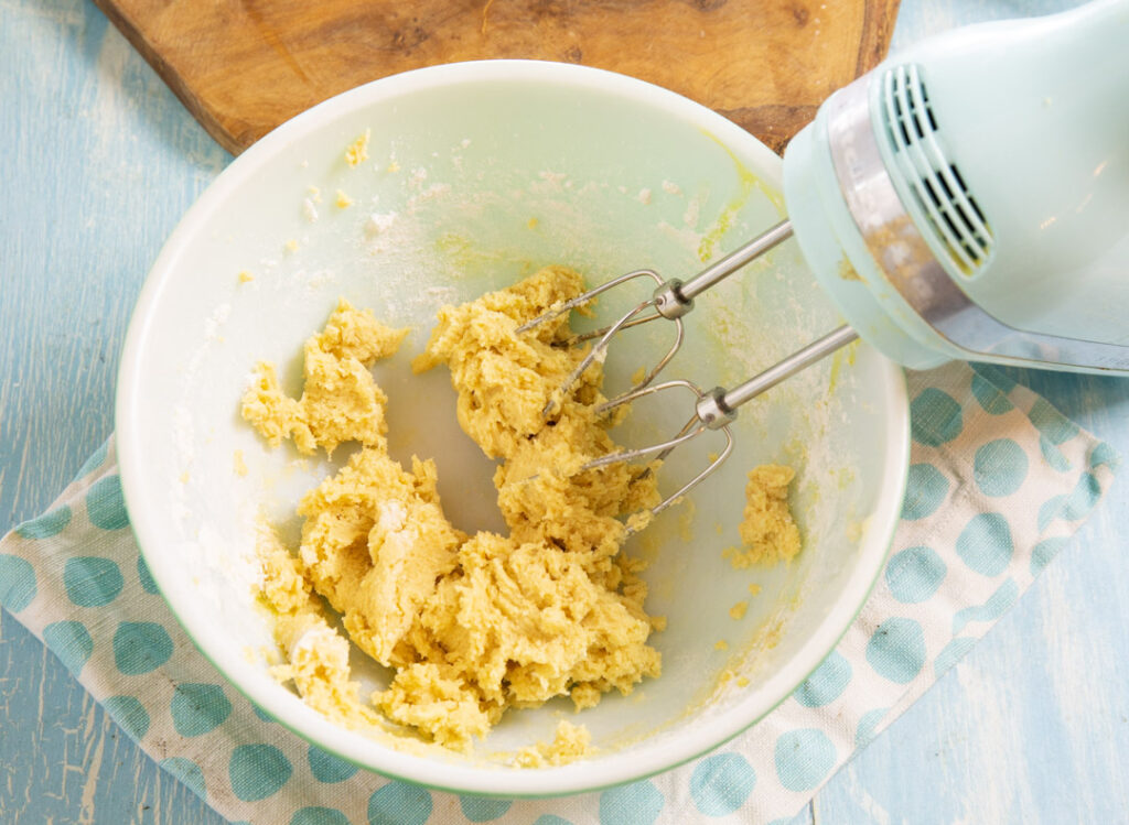 Cookie batter in a mixing bowl.
