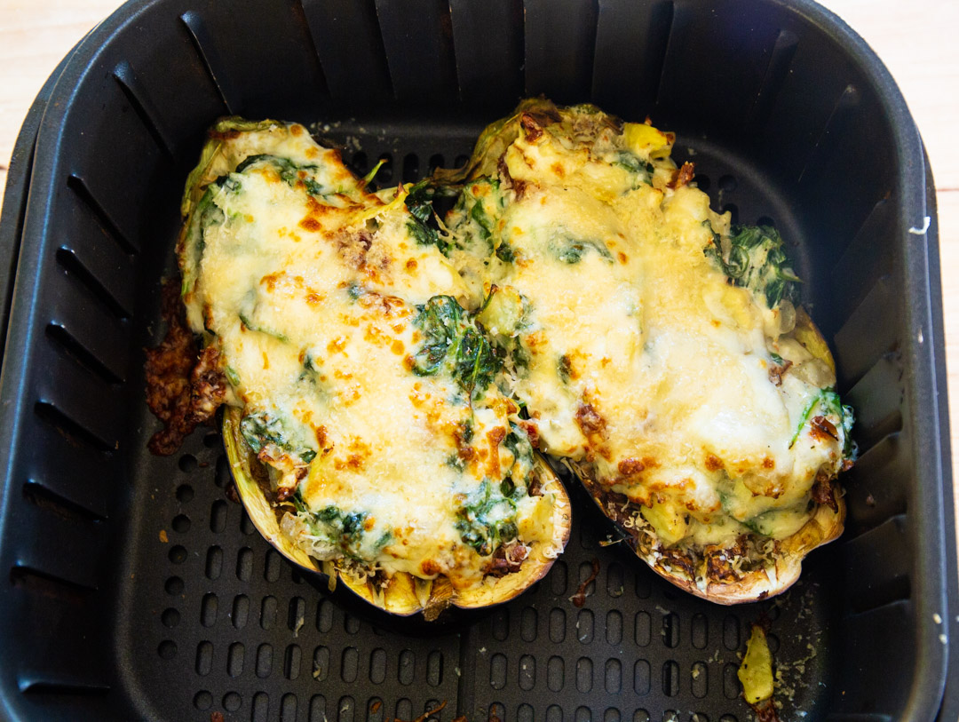 Cooked stuffed eggplant in air fryer.