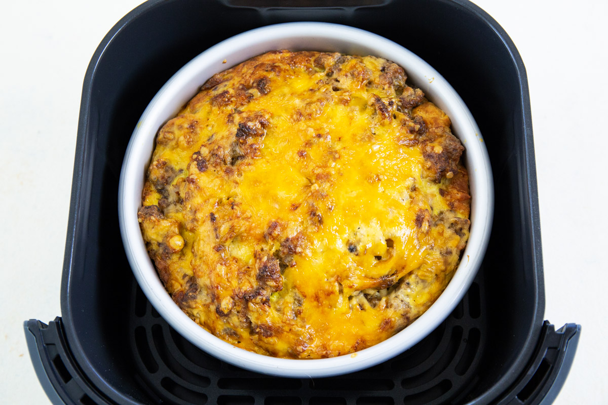 Finished casserole in air fryer basket.