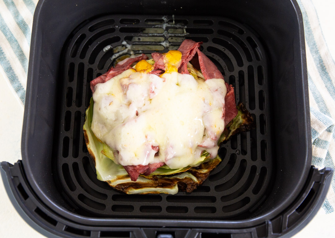 Finished dish in air fryer basket.
