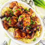 Air Fryer Teriyaki Chicken over rice on a serving platter.