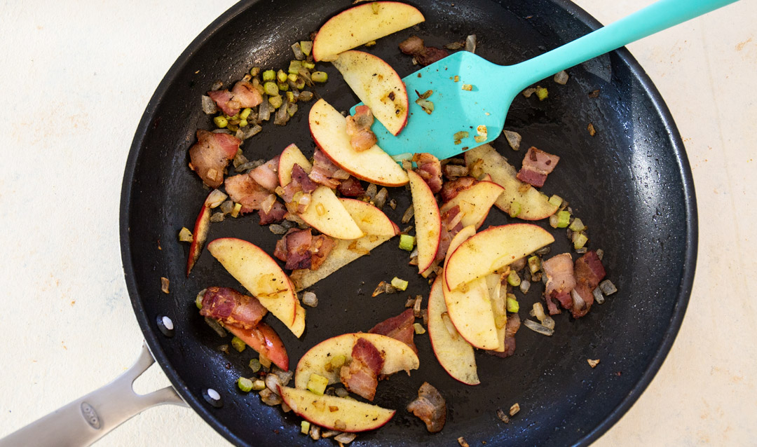 Apples added to pan.